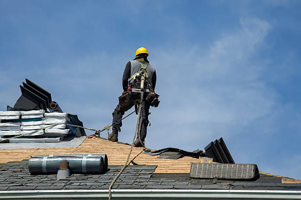Professional Roofing technician working in Center Junction, IA
